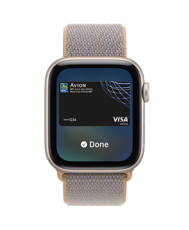 Apple Watch SE 3, aluminum case, starlight colour, screen shows Wallet, payment card graphic, right side exterior, Digital Crown dial, Sport Loop band, chambray blue colour (light blue-gray)