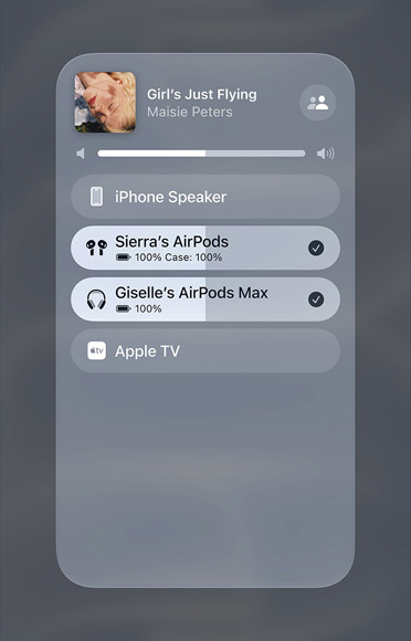 Imagem a mostrar uma música da Apple Music a tocar em dois pares de AirPods distintos.