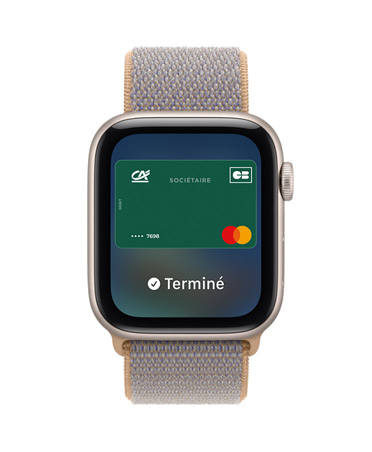 Apple Watch SE 3, aluminum case, starlight color, screen shows Wallet, payment card graphic, right side exterior, Digital Crown dial, Sport Loop band, chambray blue color (light blue-gray)