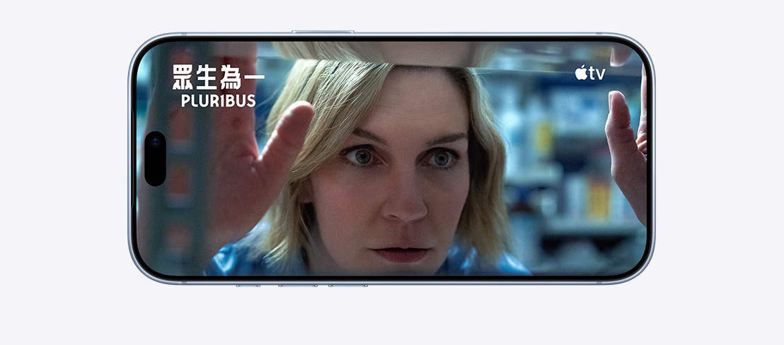iPhone 18 Pro, front exterior in a horizontal position, Apple TV show “Pluribus” plays on screen