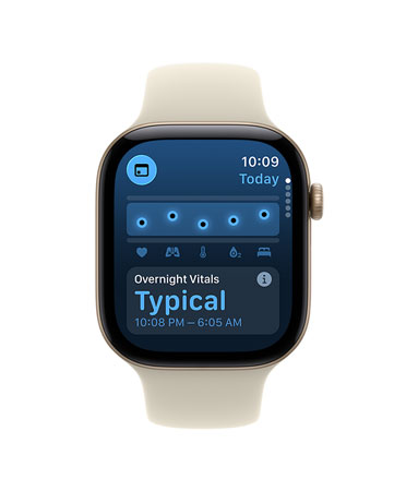 Apple Watch Series 12, screen shows overnight vitals typical notification, aluminium case, light gold colour, connected to Sport Strap, sand colour (pale tan)