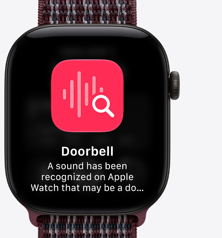 Apple Watch Series 12, screen shows sound recognition of doorbell, aluminum case, black color, connected to Sport Loop band, burgundy plaid color