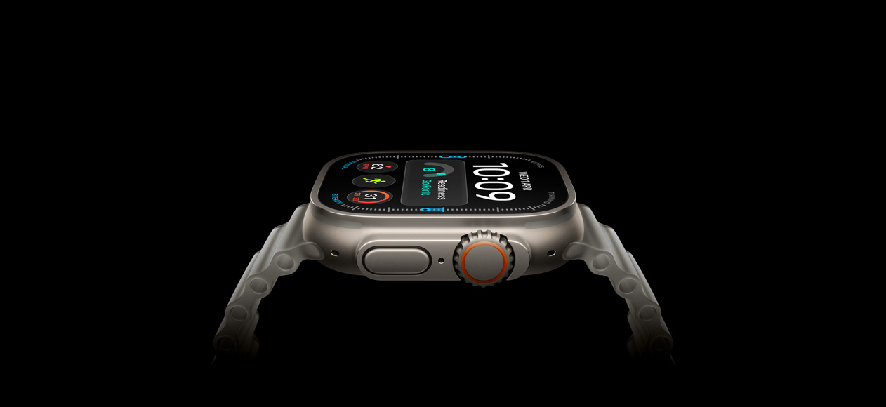 Apple Watch Ultra 4, titanium case, natural color, right exterior, Digital Crown, raised side button, digital watch face, translucent gray Ocean Band