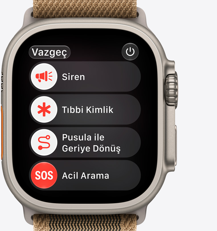 Apple Watch Ultra 4, titanyum kasa, natürel renk, ekranda gösterilen acil yardım seçenekleri: siren, tıbbi kimlik, pusula ile geriye dönüş, acil arama