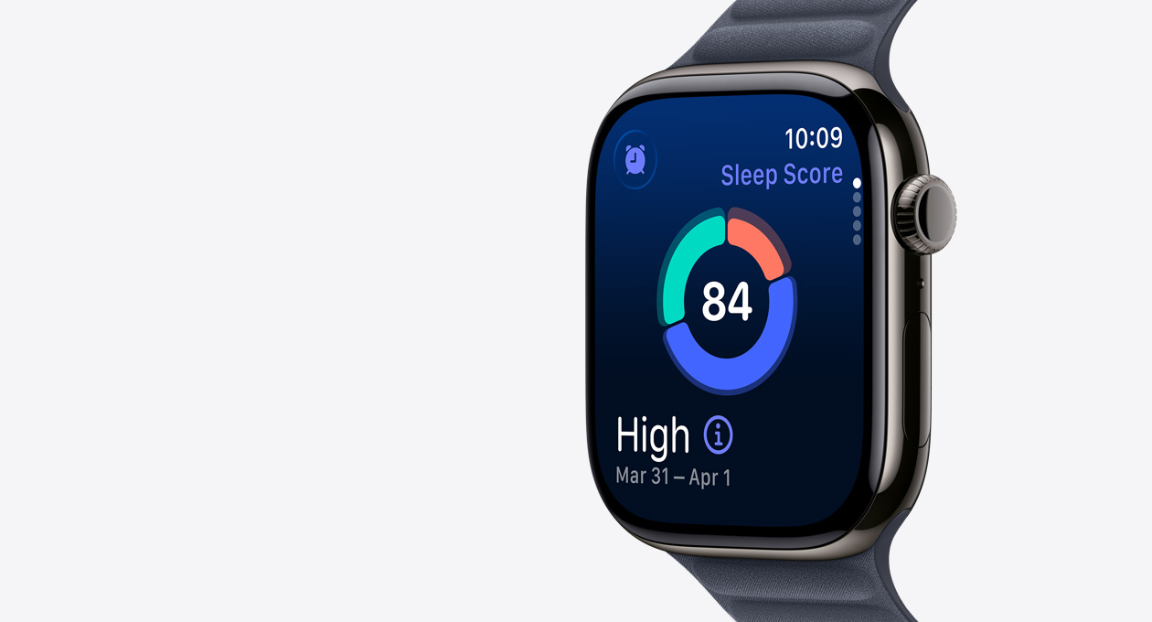 Apple Watch Series 11, slate color, titanium case, screen shows sleep score circle graph, right side exterior, Digital Crown, band, navy Magnetic Link