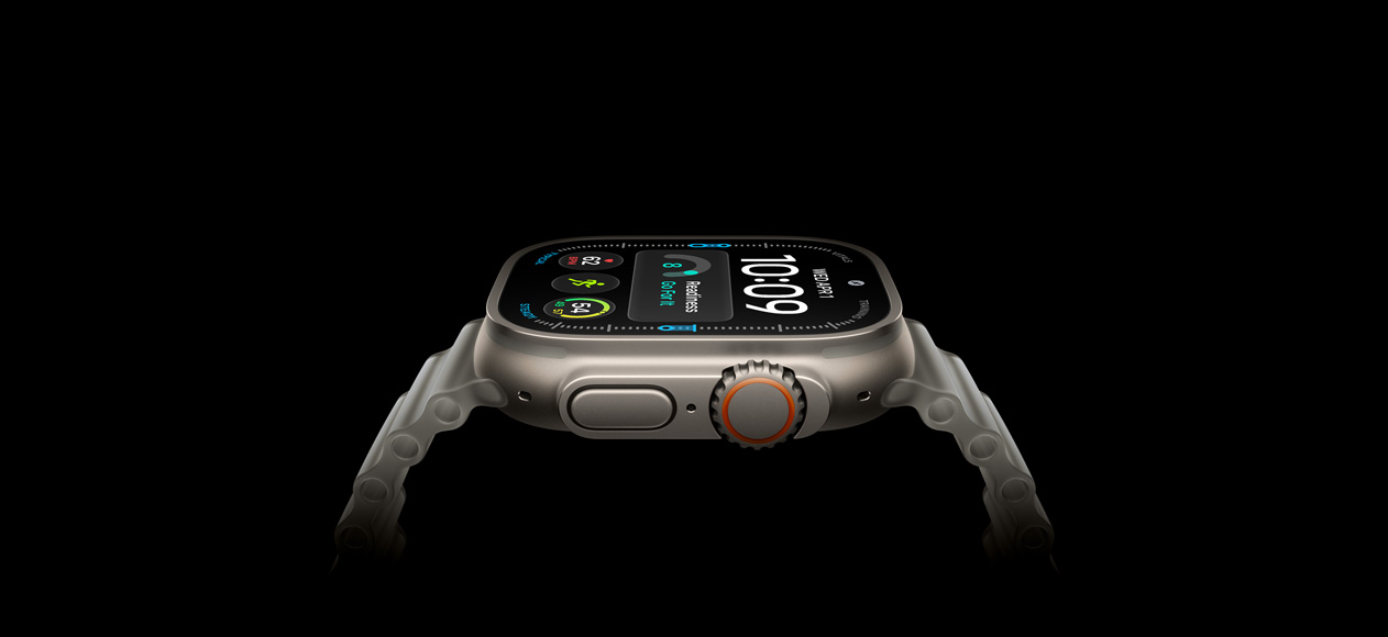 Apple Watch Ultra 4, titanium case, natural color, right exterior, Digital Crown, raised side button, digital watch face, translucent gray Ocean Band