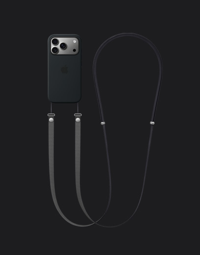 iPhone 17 Pro, aizmugure, sudraba apdare, melns silikona ietvars ar MagSafe, piestiprināta tumšpelēka Crossbody siksniņa